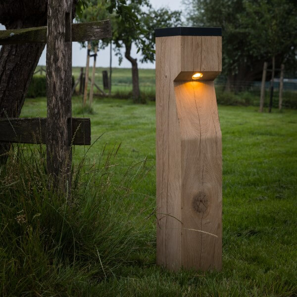 Oak path lighting with a solar panel in the garden