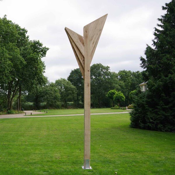 Wooden pole with wings in the garden for bats