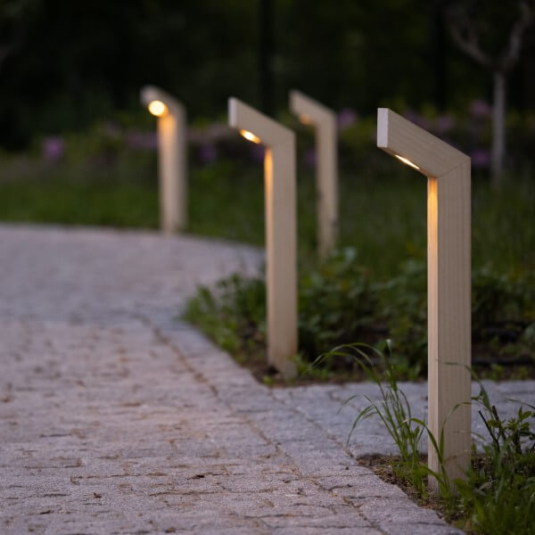 Wooden path lighting along the driveway with angled head